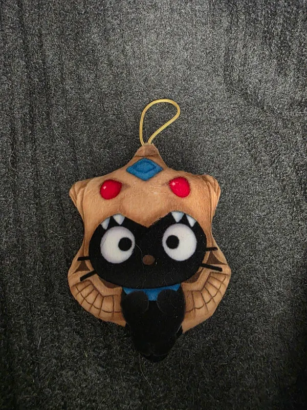 Chocolate dressed as The Winged Dragon of Ra