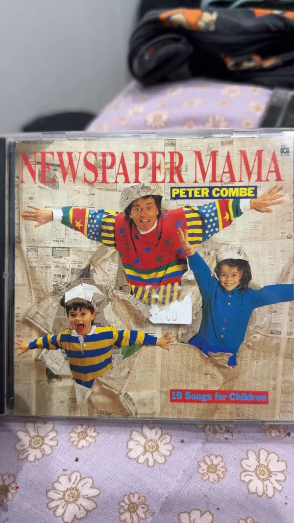 Peter combs cd newspaper mumma