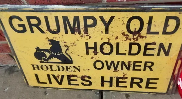 Grumpy old Holden owner lives here tin sign