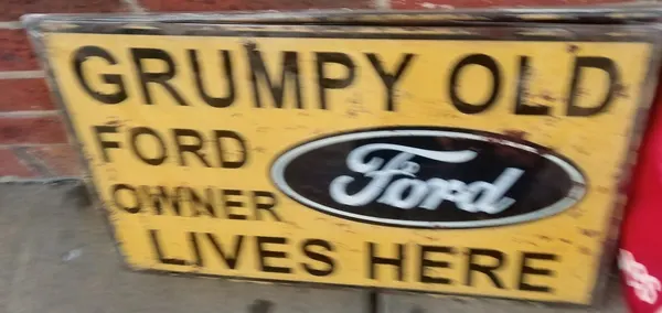 Grumpy old Ford owner lives here tin sign