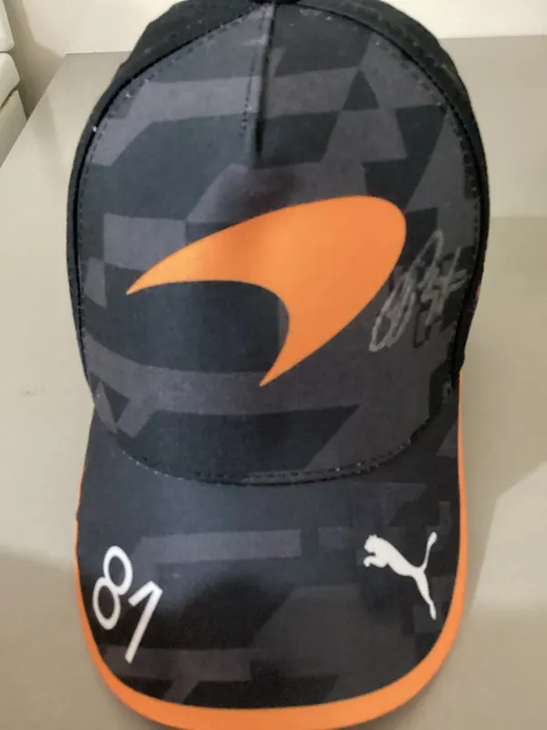 Oscar Piastri signed 1000thGP cap brand new