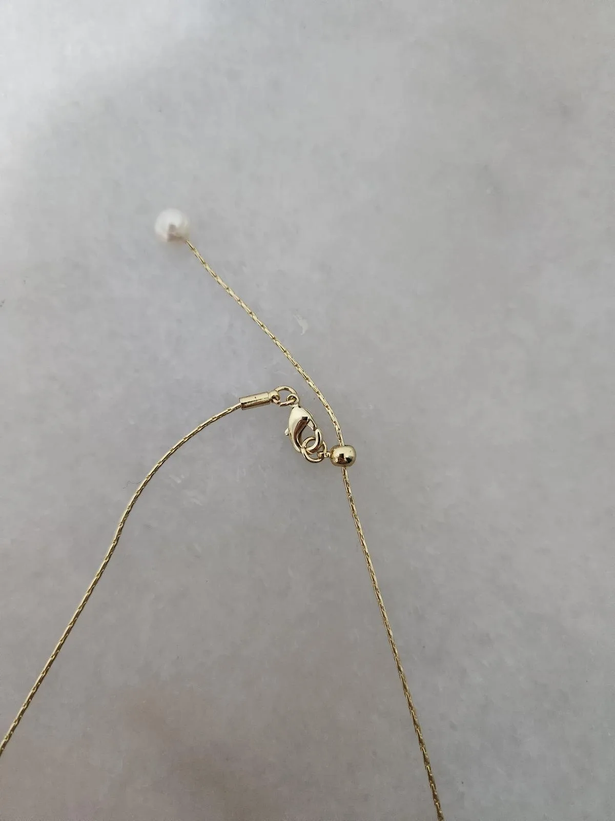 Gold tone adjustable pearl necklace — photo 4