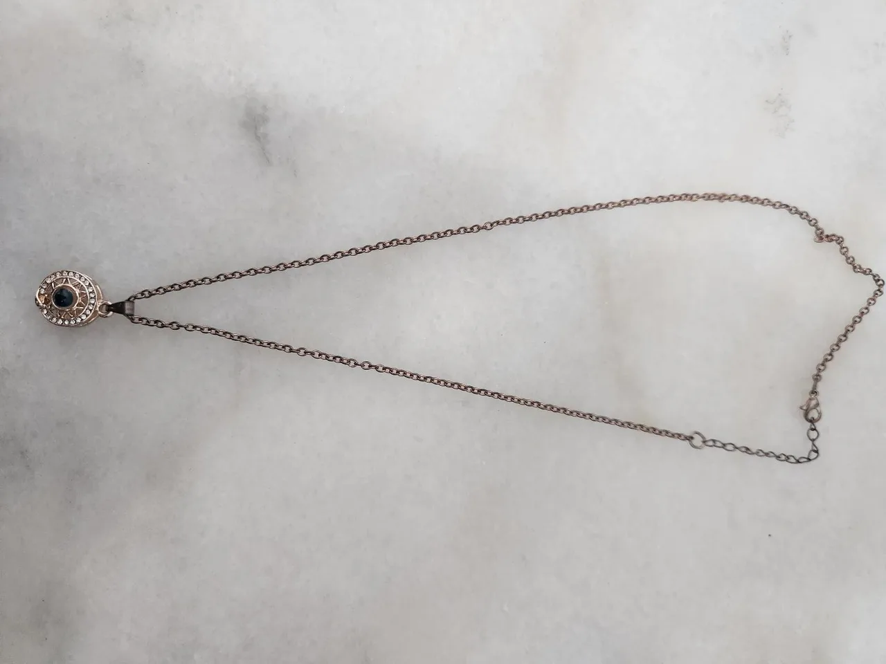 Rose gold tone sun and moon projection necklace — photo 2