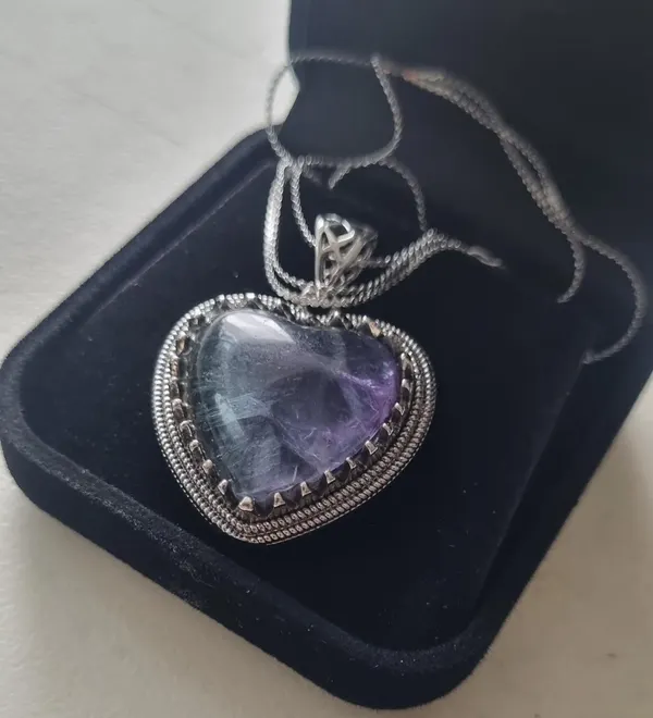 Heart pendant in silver coloured frame