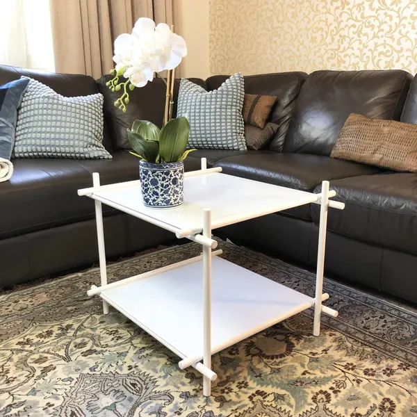 White Glass & Steel Stick Coffee Table – Designer Style