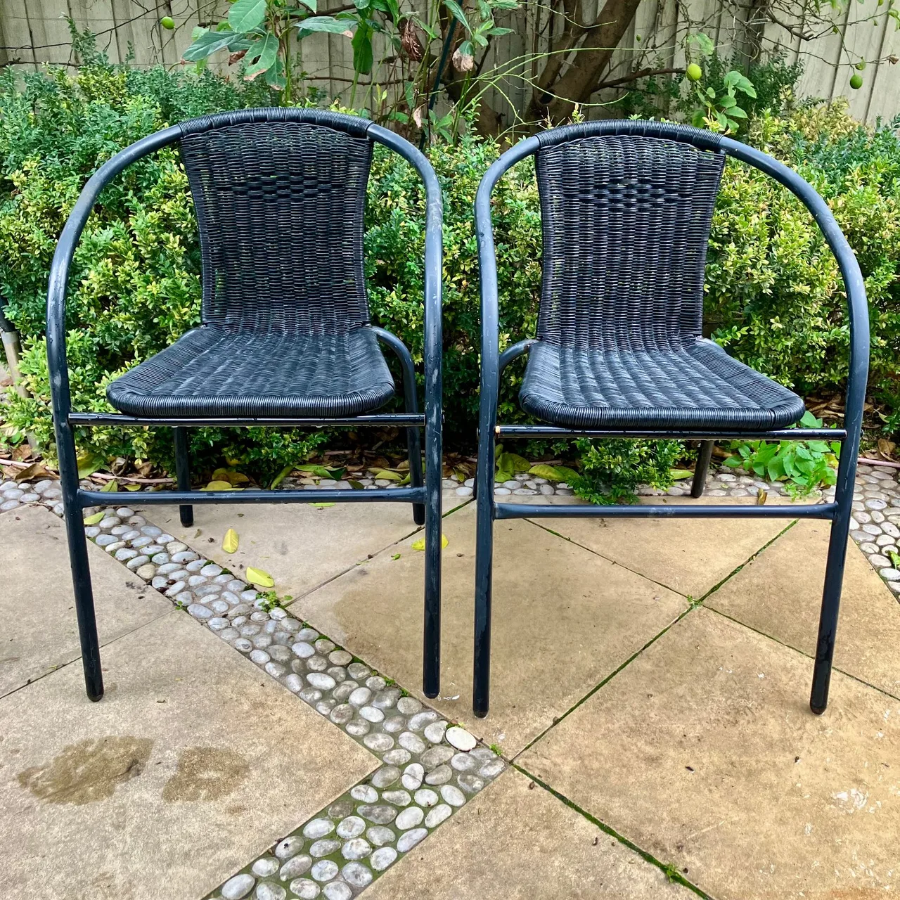 Two black outdoor stacking bistro chairs — photo 2
