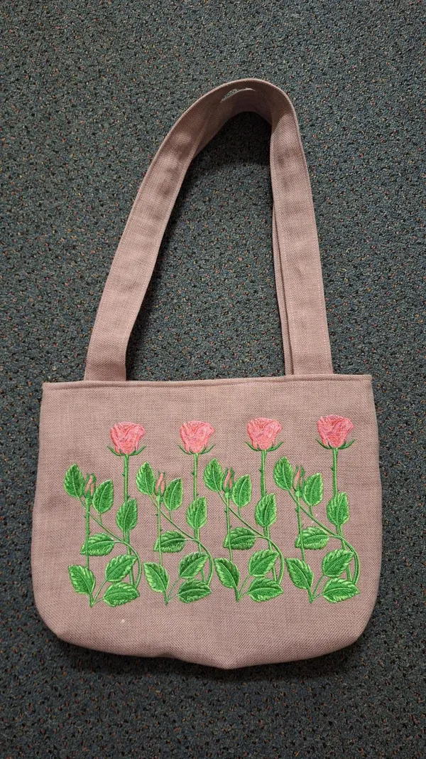 Embroidered tote bag with floral design