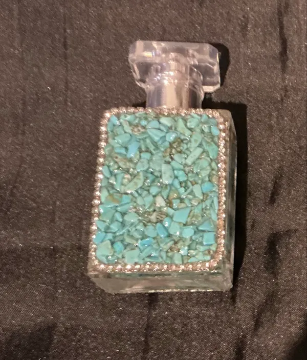 turquoise crusted perfume bottle