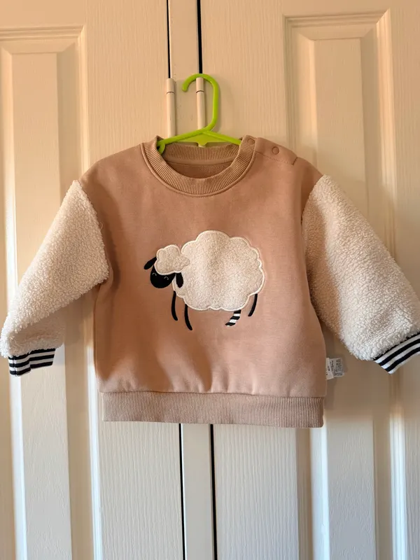 Cream and tan sheep sweatshirt size 2