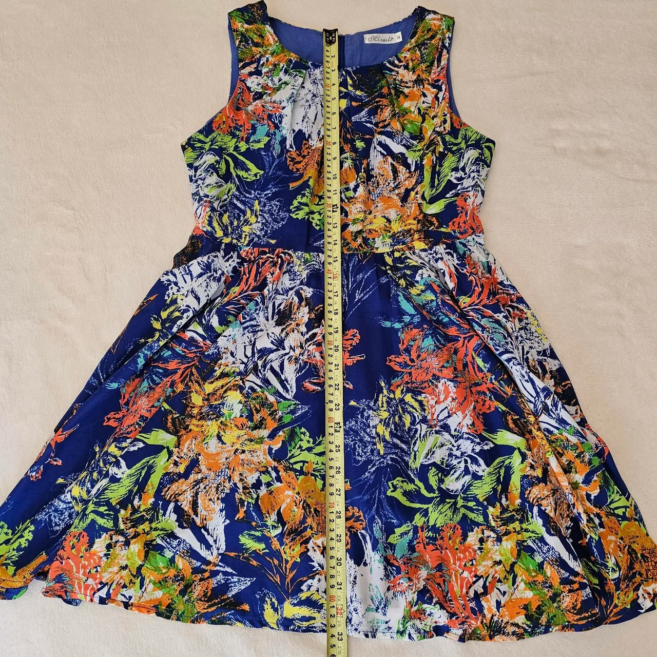 Miracle sleeveless A-line mini dress - 14. — photo 4