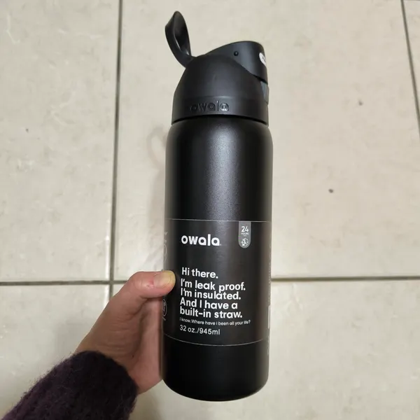 Owala black water bottle with built-in straw