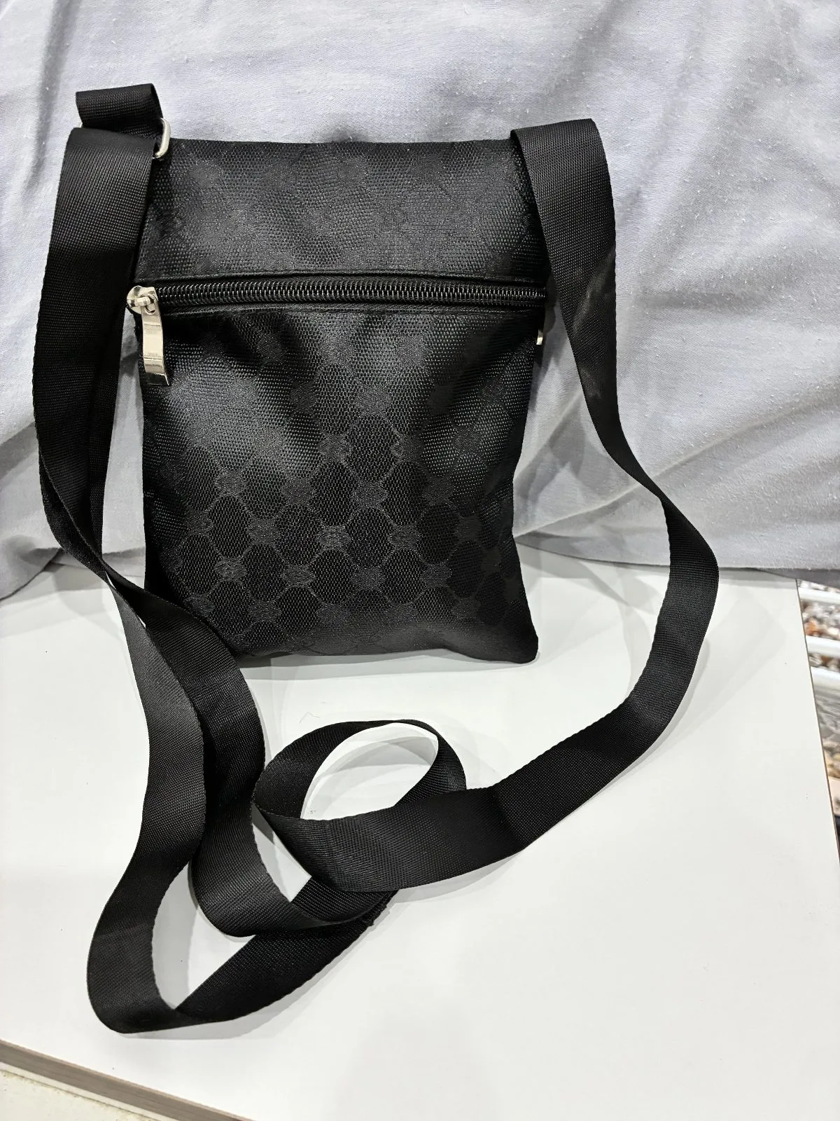 Flat crossbody bag crafted from durable black nylon canvas woven strap — photo 2