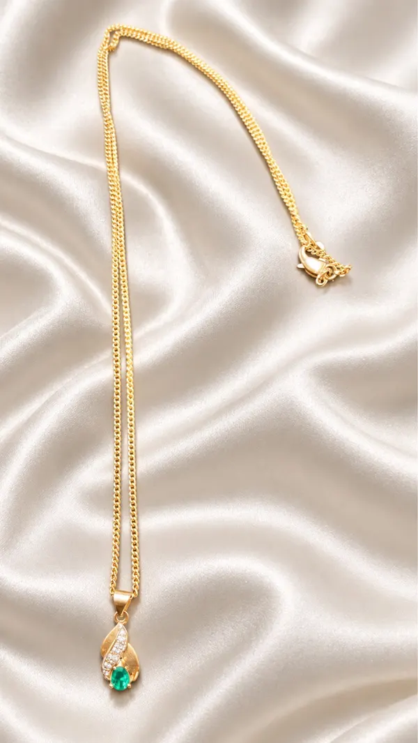 Emerald & diamond 9kt gold pendant with complimentary chain
