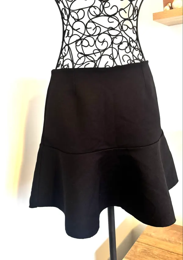 Country Road Black Trumpet Flare Mini Skirt.