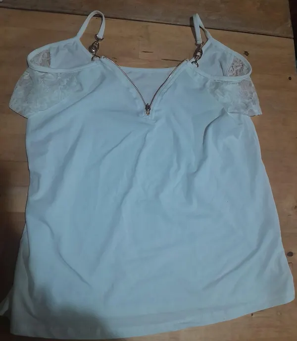 White top with gold chian accents