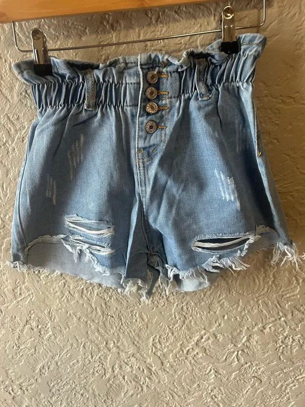 Blue denim distressed shorts