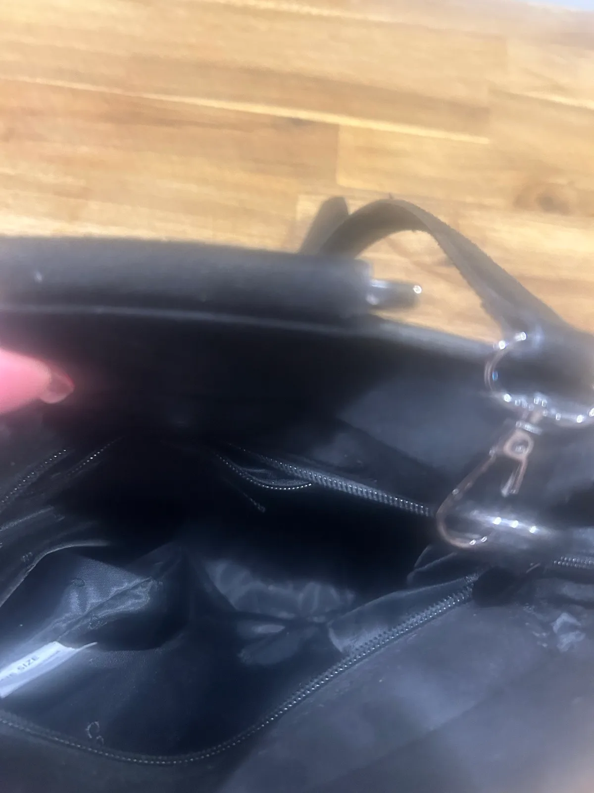 Small black handbag with metal handles – photo 8