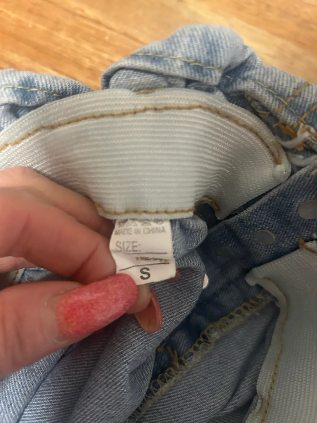 Blue denim distressed shorts – photo 3
