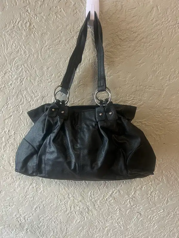 Black faux leather handbag with silver tone hardware