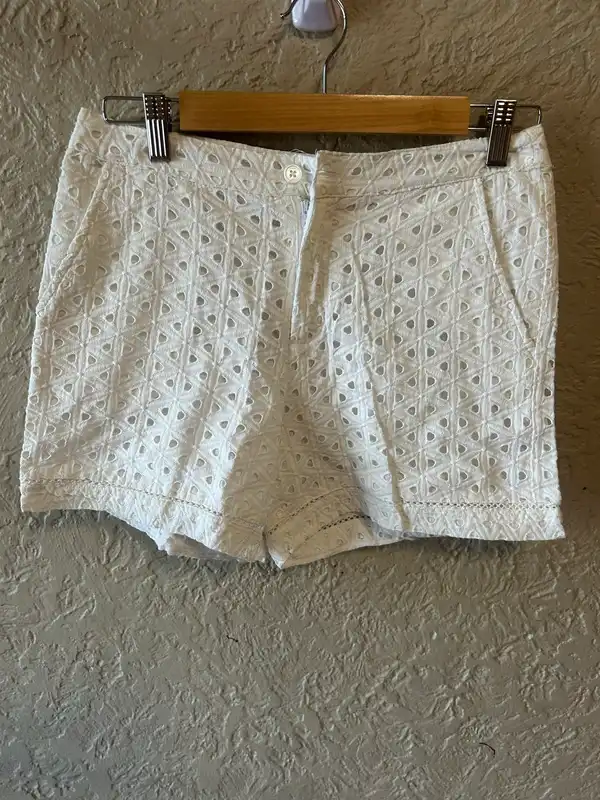Now women’s white eyelet shorts