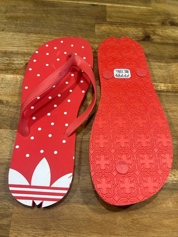 Women’s red adidas thongs