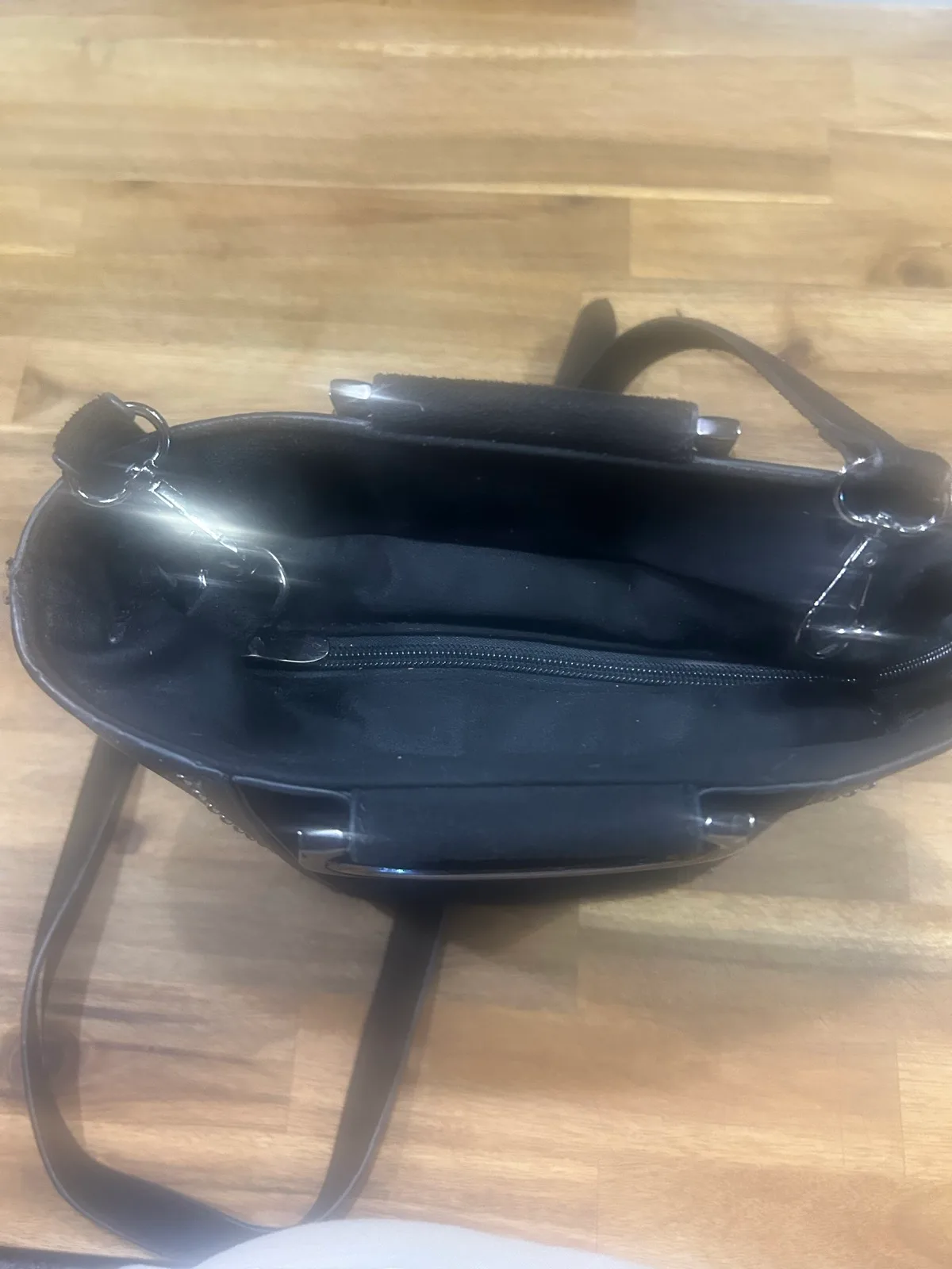 Small black handbag with metal handles – photo 7