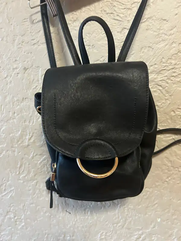 Black faux leather backpack