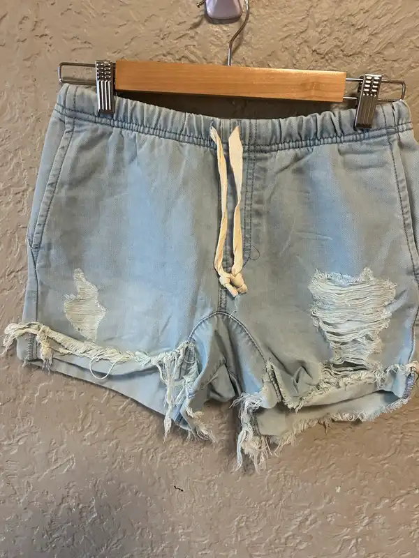 Supré distressed look light blue denim shorts