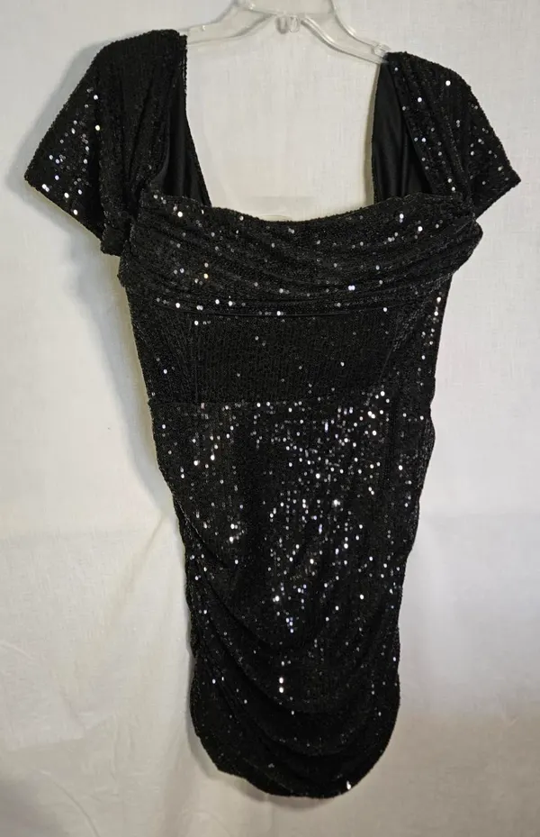Black sequin off the shoulder dress with black sequins