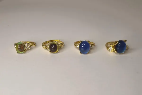 Gold accented mood rings