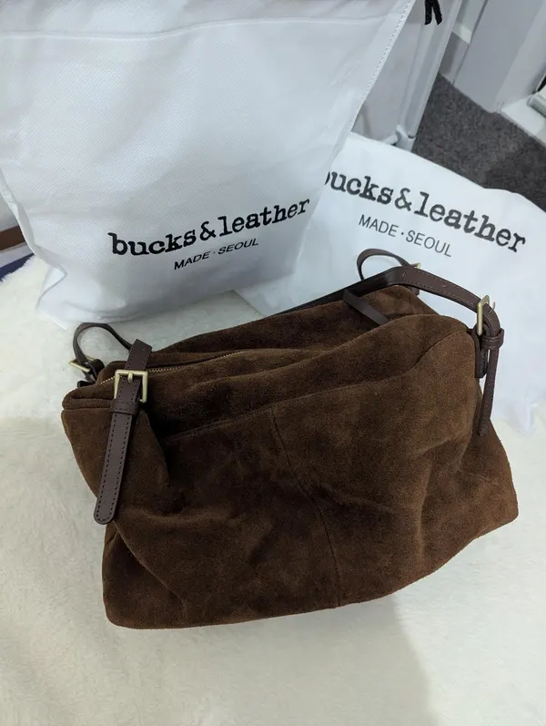 Bucks and leather bag