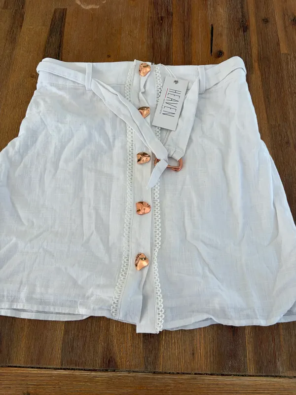 Heaven pearl button up mini skirt size s