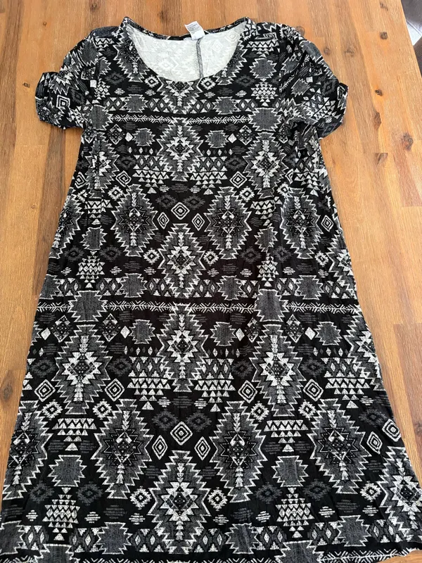 Now dress size 14