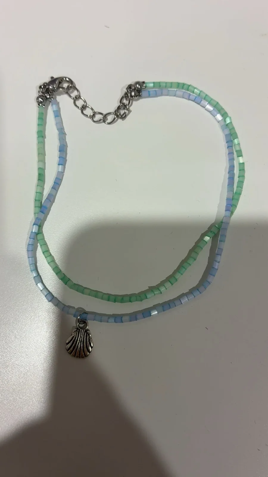 Blue and green beaded anklet with silver shell charm – photo 2
